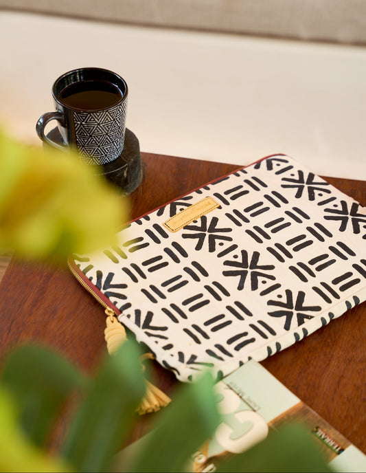 White mudcloth print laptop sleeve for 13 to 14 inch laptop, front view