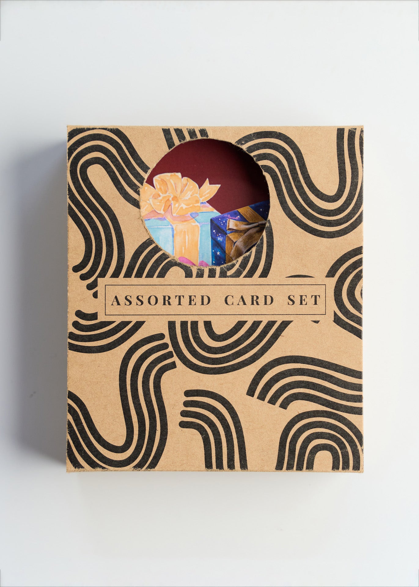 Box of assorted cards with decorative patterns.