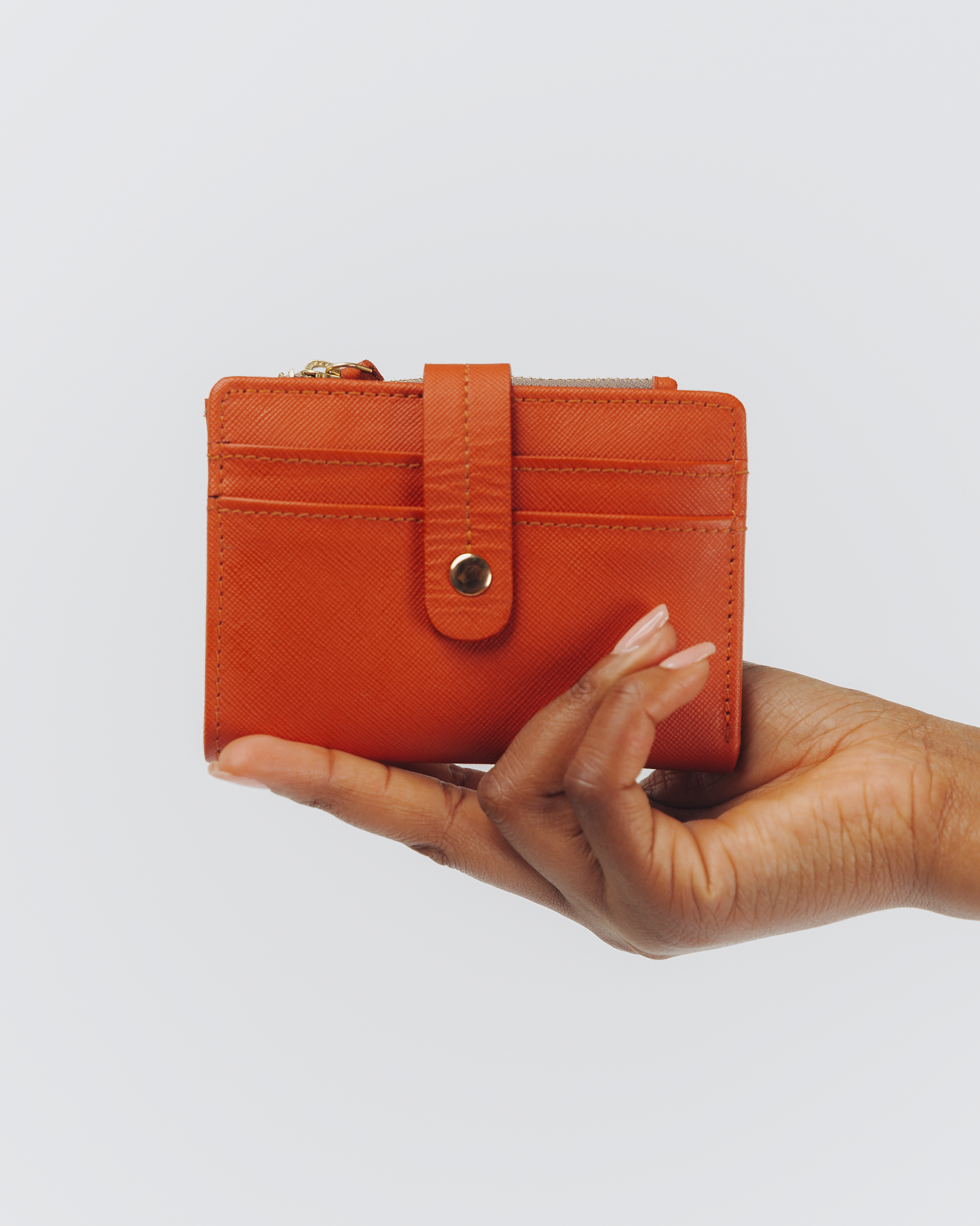 Compact bifold leather wallet front view