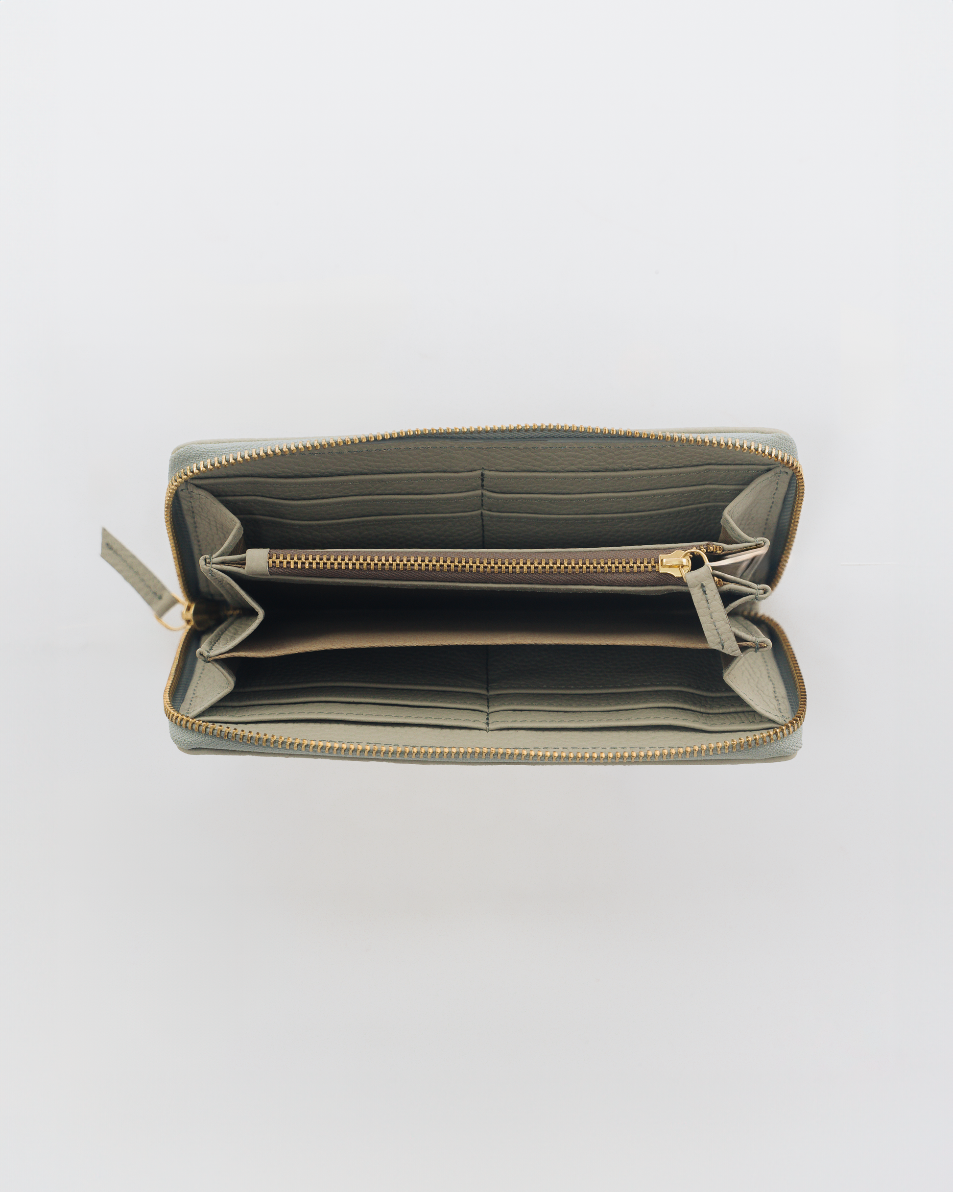 Grey Essential zip wallet interior showing card slots and inner zipped wallet