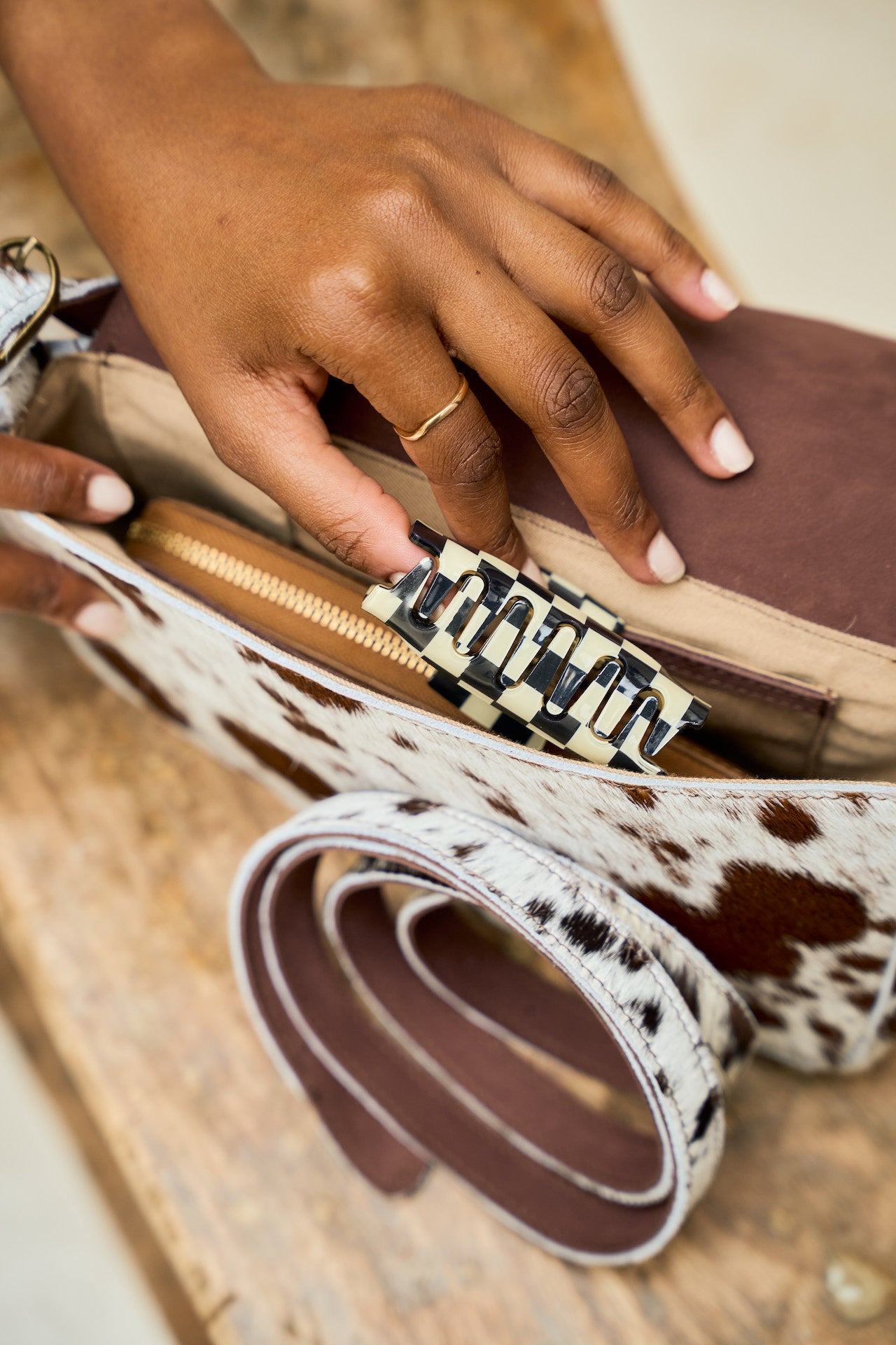 Close-up of brown cowhide handbag interior 