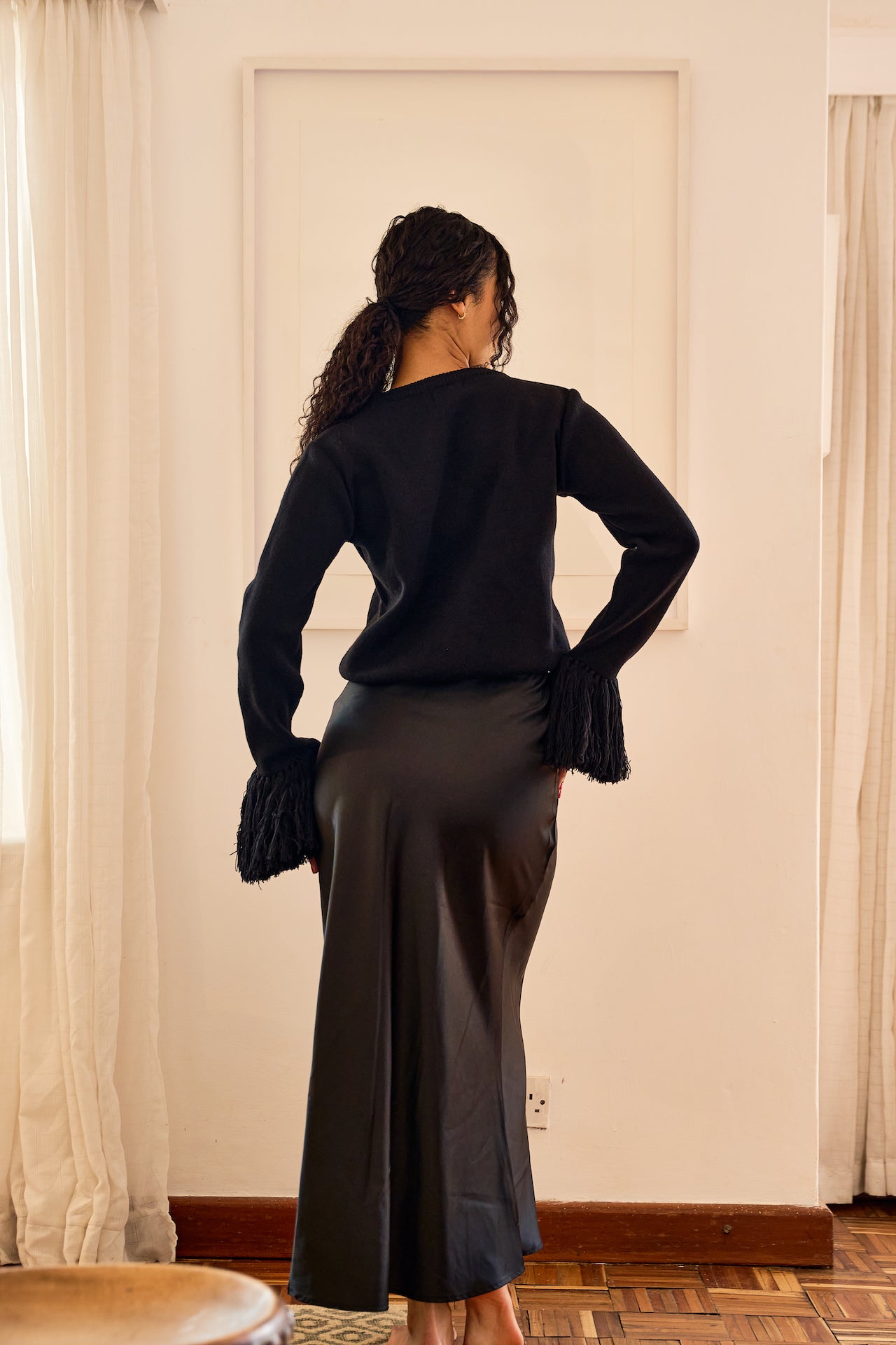 Nia fringe sweater black, back view