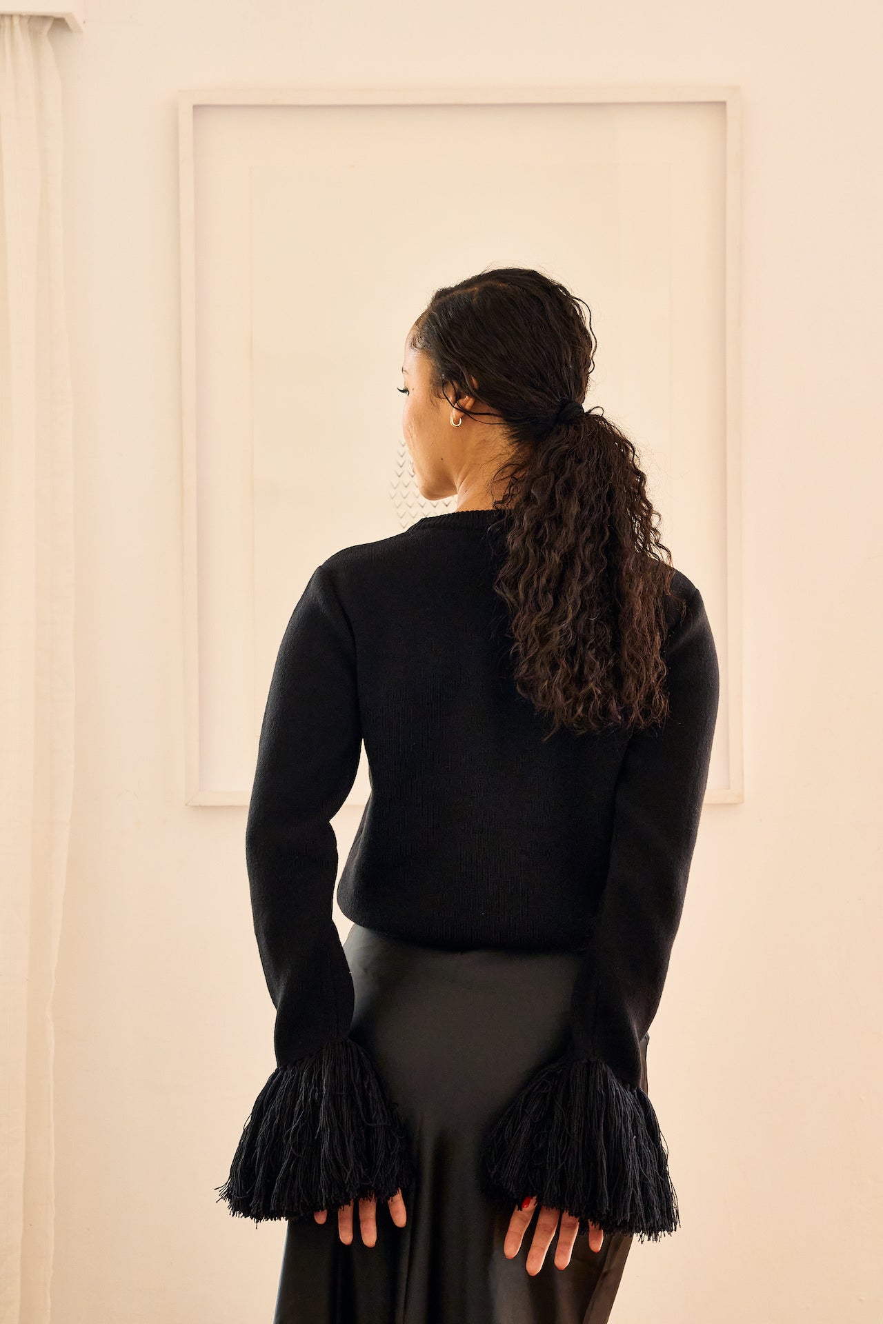 Nia fringe sweater black, back view