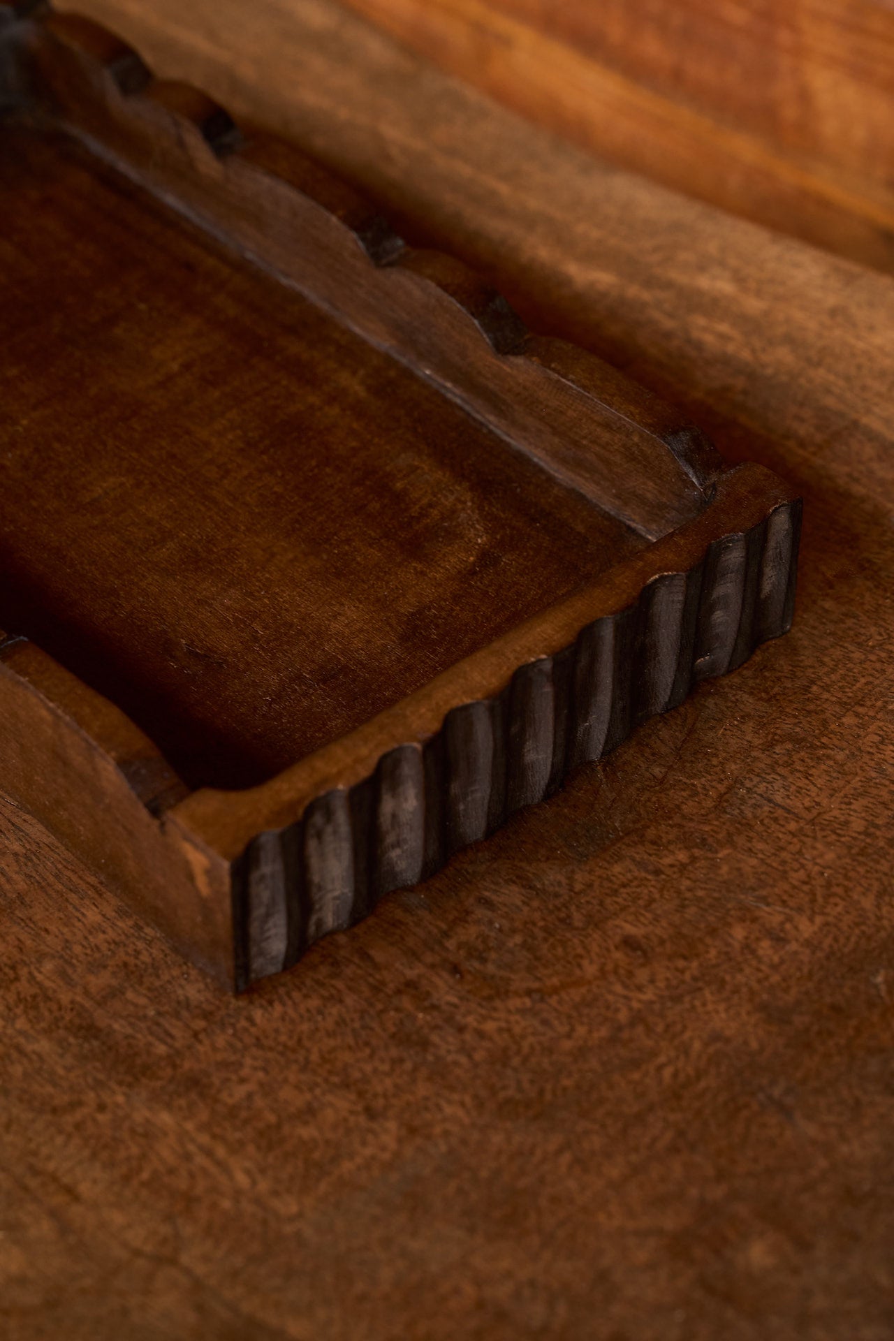 Close-up of Shela scalloped wooden tray