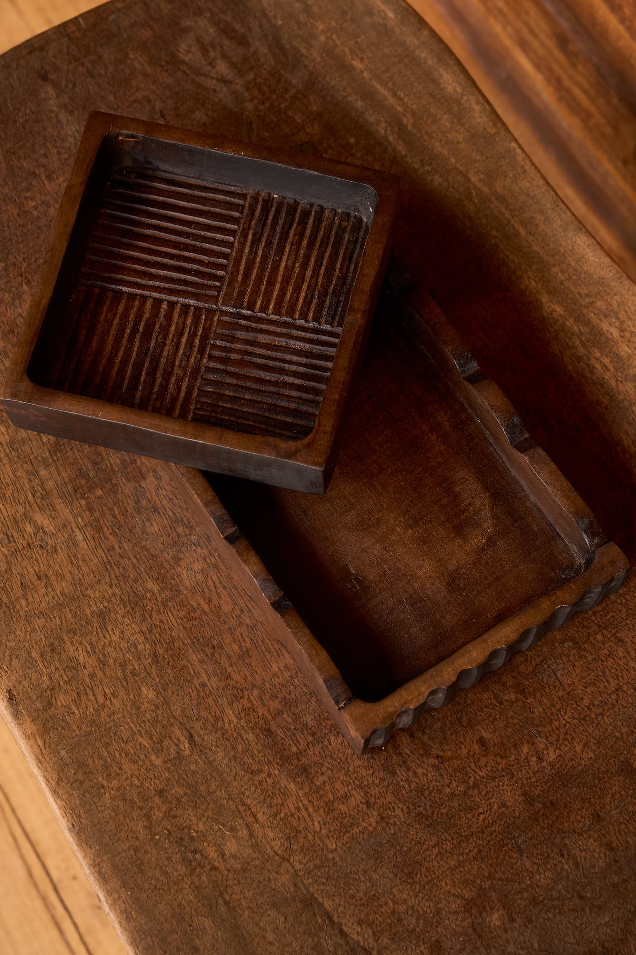 Two handcrafted wooden trays